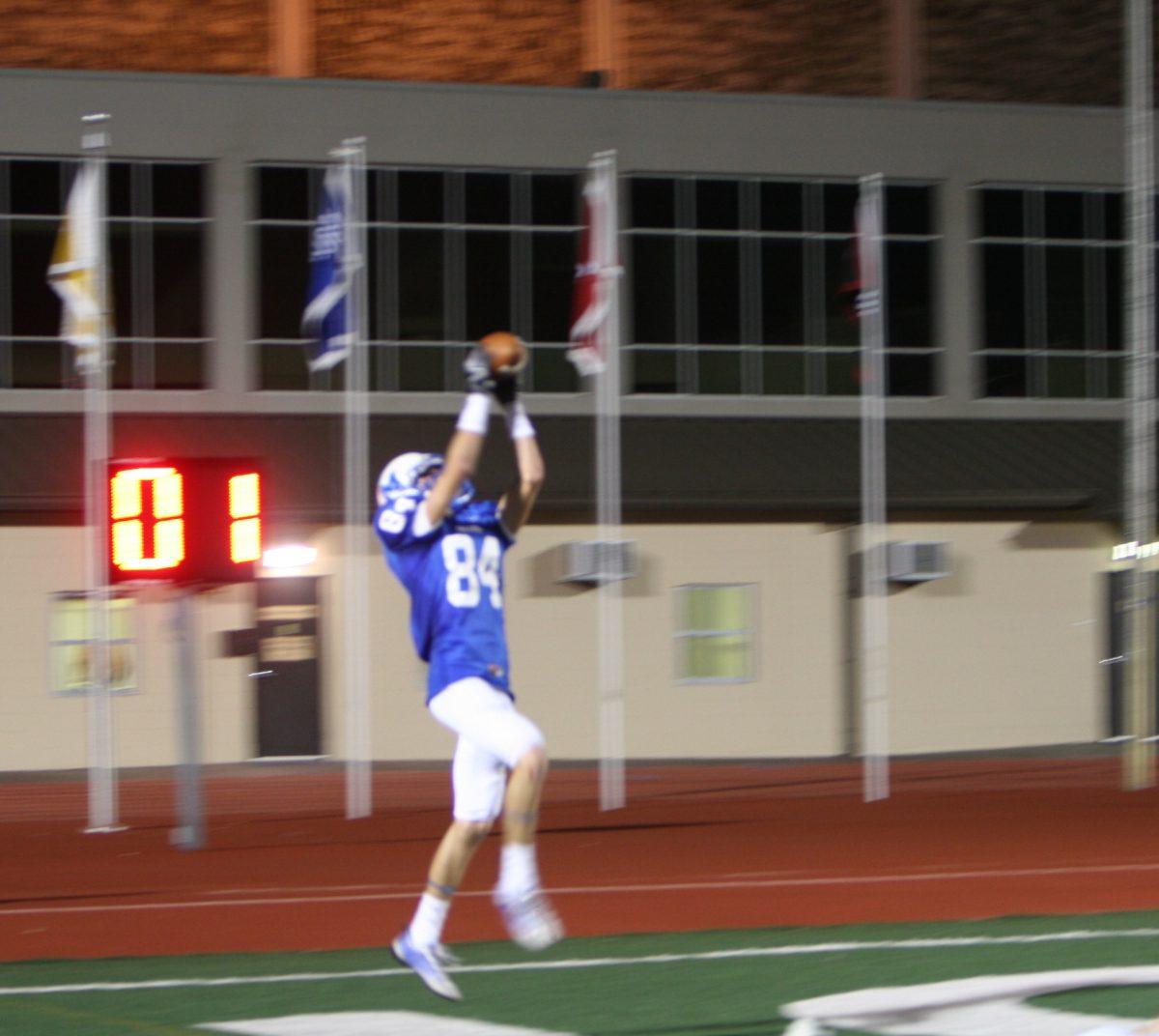 David Eberwine (12) scores again with a short catch in the end zone.