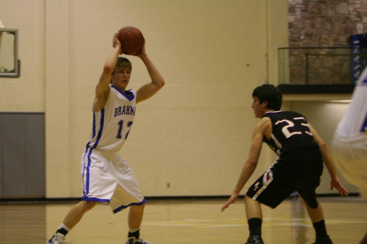 Zach Collins looking to pass. photo by Zach Royston