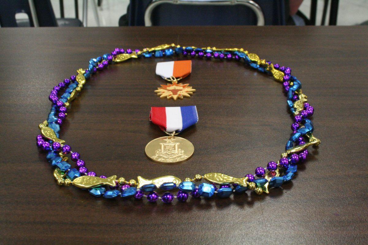 The Texas Medal (top) is one of the official medals of Fiesta.