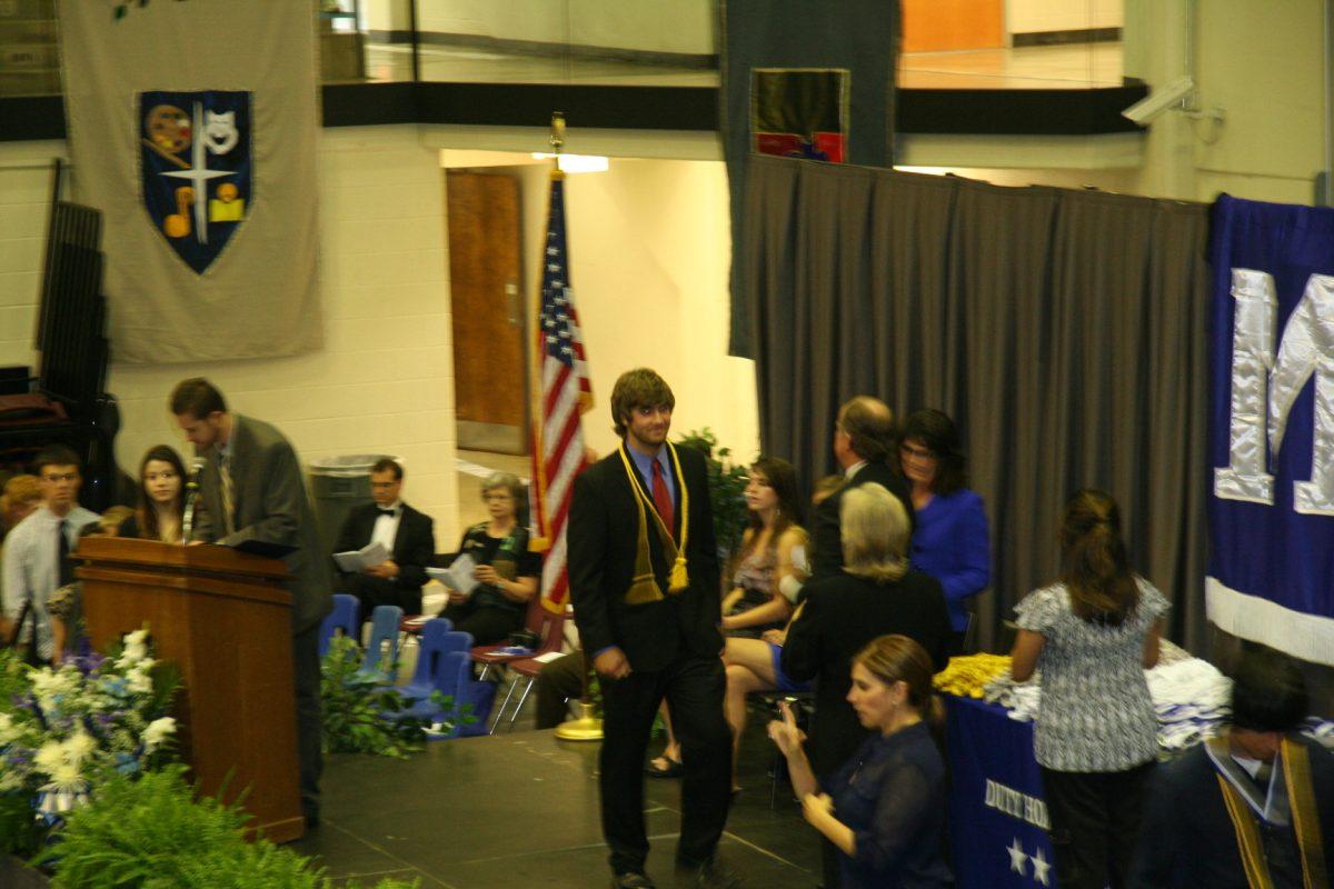 A senior receives his award. Picture by Luke THacker