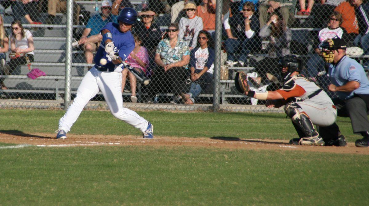 Kent Perez, 12, up to bat. Photo by Maddy Tompkins.