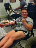 Erin Alva excited to donate blood. Photo by Stephanie Smith