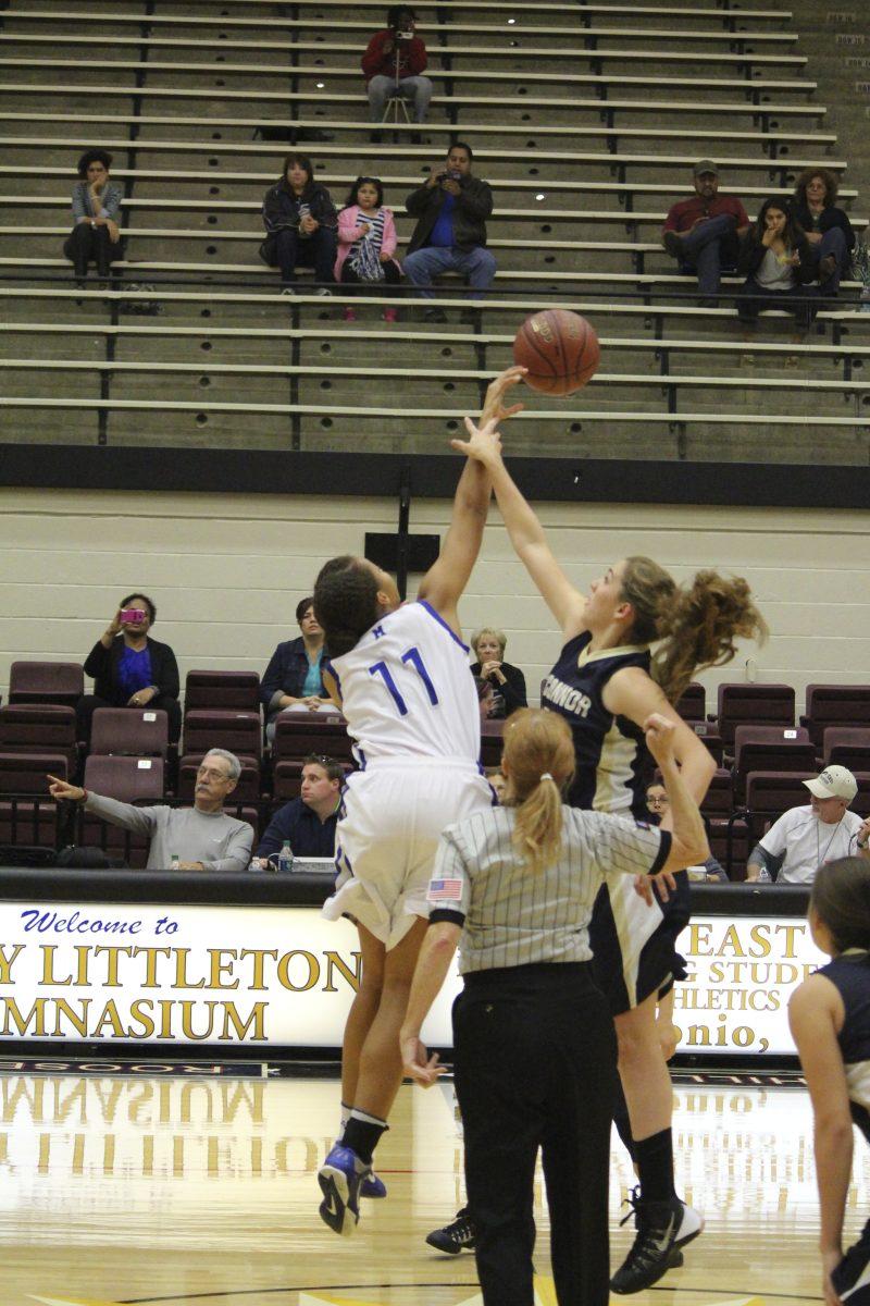 #11 BreAnn Ford to the middle for jump ball at the beginning of the game
Photo by: Kayla Martin