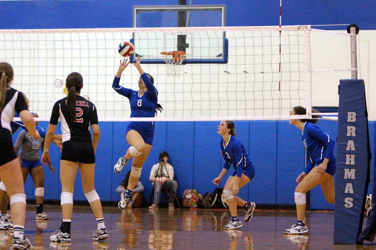 Varsity volleyball vs. Churchill Chargers.