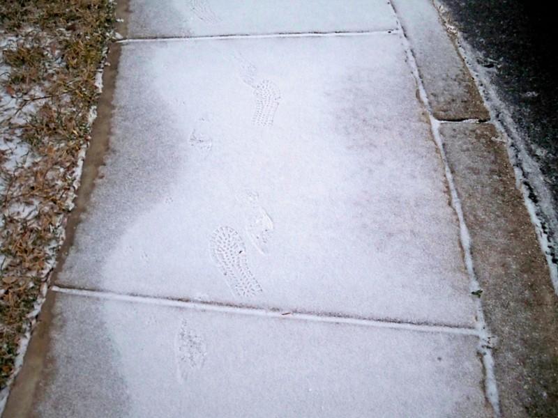 Light frost covering sidewalks. A perfect reason to stay in and listen to music. Photo by Kayla Gunn.