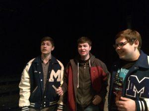 PFC members Ethan Burrows, Shawn McGinnis, and Chris Hale singing at Open Mic Night in order to advertise their concert. Photo by Kayla Gunn