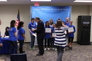 Students receiving their certificates. Photo by Jacob Dukes