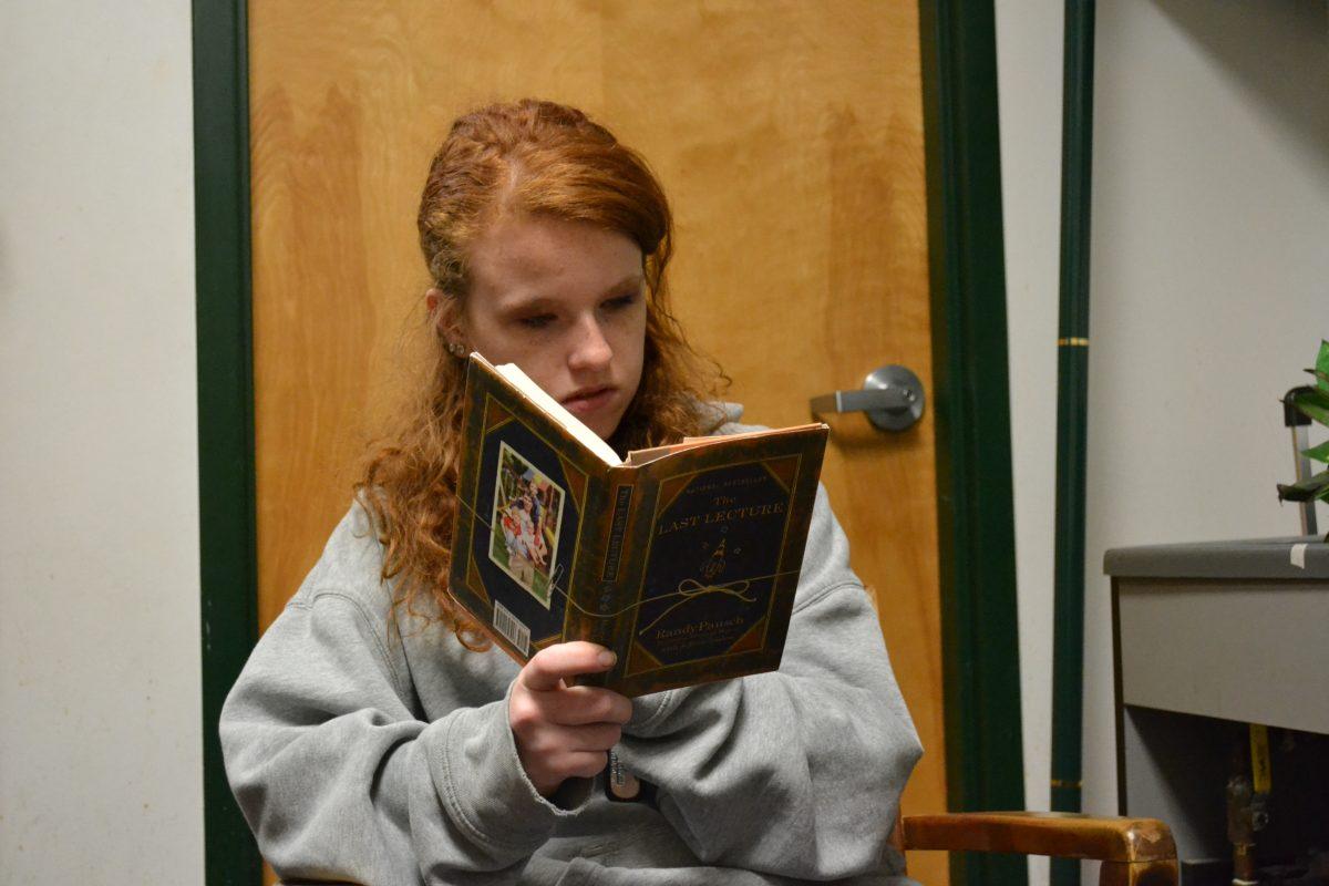 Erin reading The Last lecture. Photo by Vanessa Ramirez 