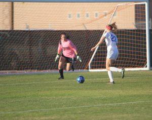 Junior forward Kyra Falcone prepares to shoot, despite missing on this attempt. Photo by Jacob Dukes