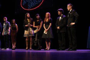 Each performer stands on stage with a big smile after the winners are announced. Photo by Amaparo Gil.