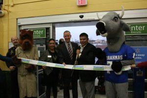 The rope being cut to officially open the new Walmart                           Photo by: stephanie