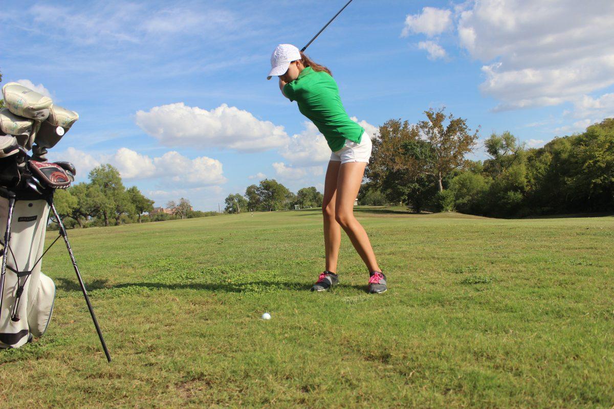 Senior Shannon Douglas, about to hit the ball. Photo by Stephanie Martinez