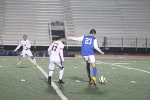 Senior midfielder Gustavo Rangel passes the ball across the field. Photo by Jacob Dukes