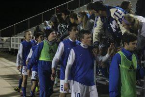 Players and fans take part in a post-game celebration after a close game. Photo by Jacob Dukes