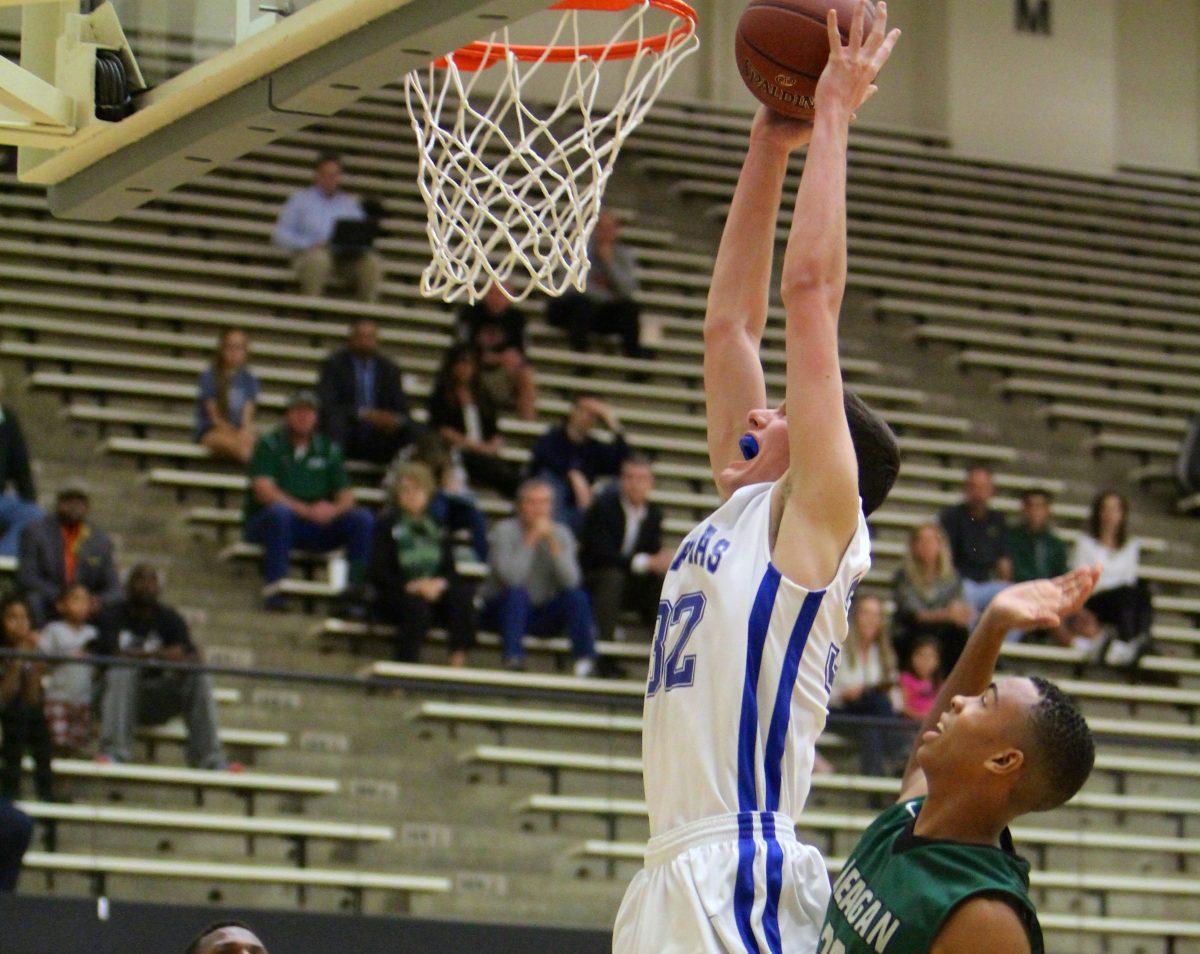 Varsity boys basketball vs. Reagan