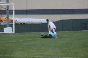 Senior Alex Steinmetz shots once, hitting the goalie in the hands, but then scored off of the rebound. Photo by Jacob Dukes