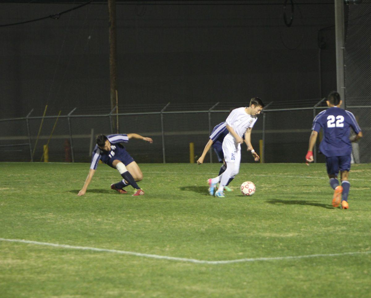 Vidal's hat trick leads boys to win