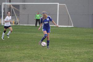 Senior Sydney Anderson receives a pass from a teammate. Photo by Jacob Dukes