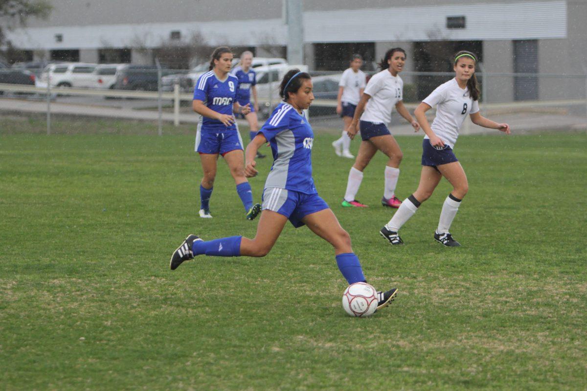 Girls ride past Roosevelt