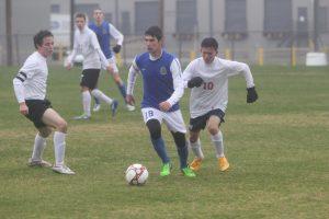 Senior Parker Miller runs down the field and loses two defenders. Photo by Jacob Dukes