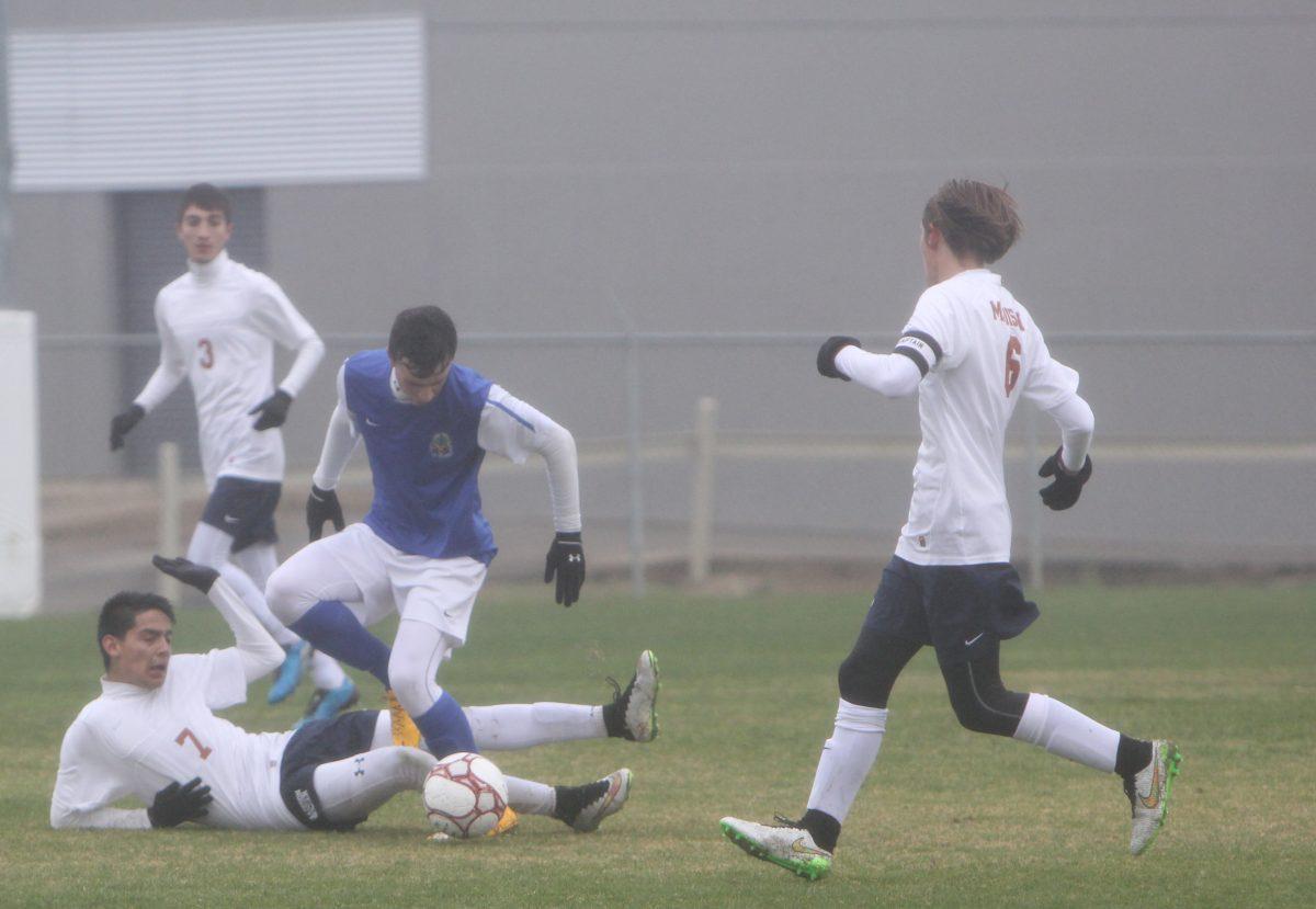 Boys win despite weather