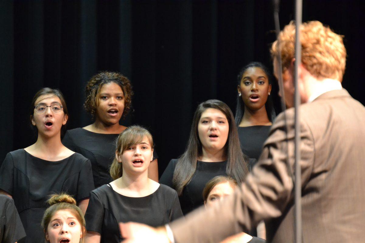 Mixed Choir performing with Men's Varsity Choir in a September concert. Photo by: Cassandra Chapa