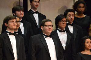 Men's Varsity choir performing alongside the mixed choir. Photo by: Cassandra Chapa