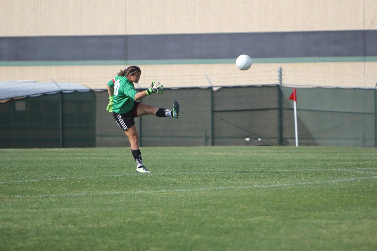 Junior goalkeeper Mary Cardone punts the ball out of the box.
Photo by Jacob Dukes