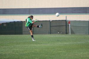 Junior goalkeeper Mary Cardone punts the ball out of the box. Photo by Jacob Dukes