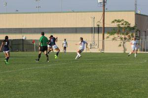 Sophomore defender Neely Haby scoring her goal in the match. Photo by Jacob Dukes