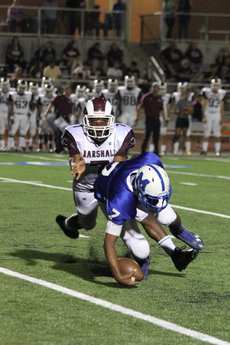 Charles Henderson (10) runs the ball