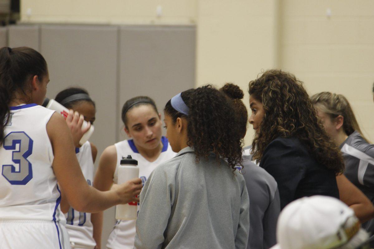 A photo wrap up of Girls varsity basketball first game.