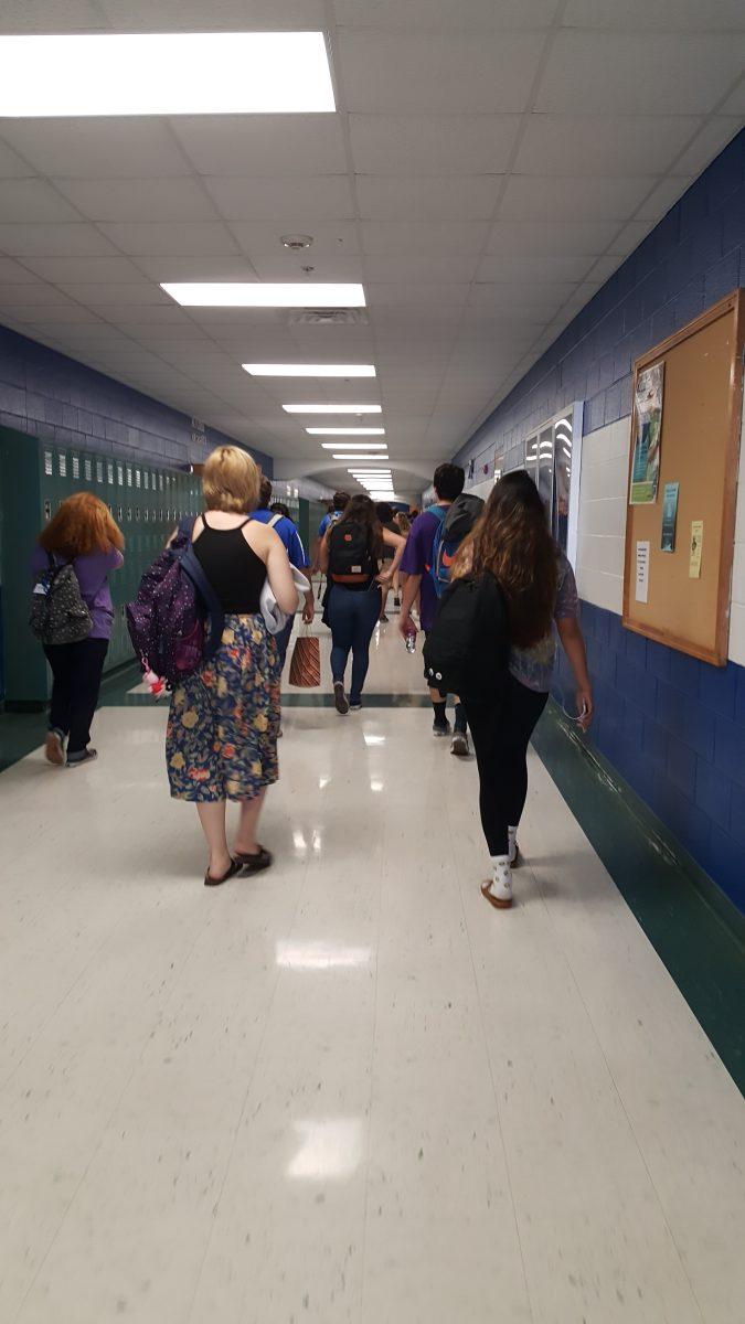 Students walk down the hallway to get to their classrooms. photo by Hannah Monita