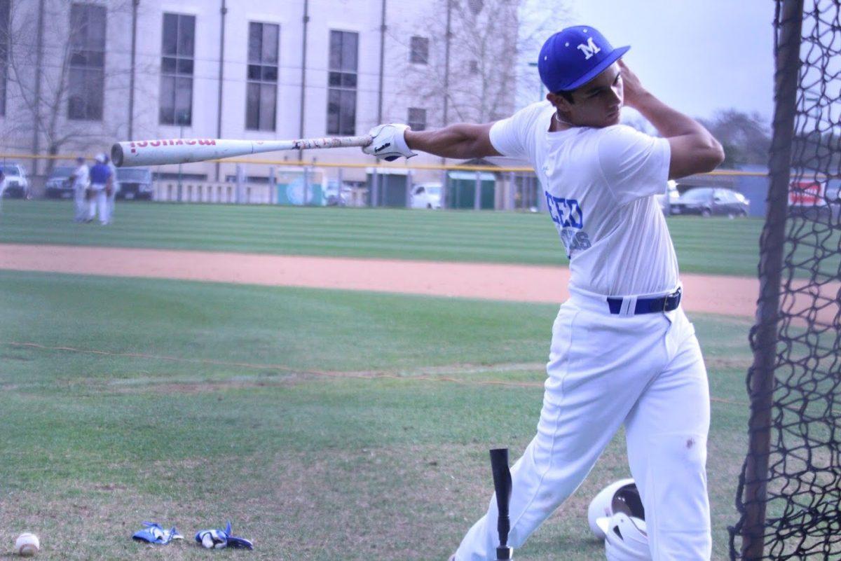 Senior Issac Velazquez practicing his hitting