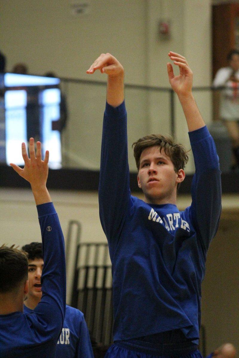 Garrett Prince, junior, practicing his free throws before the game against Madison on January 12.